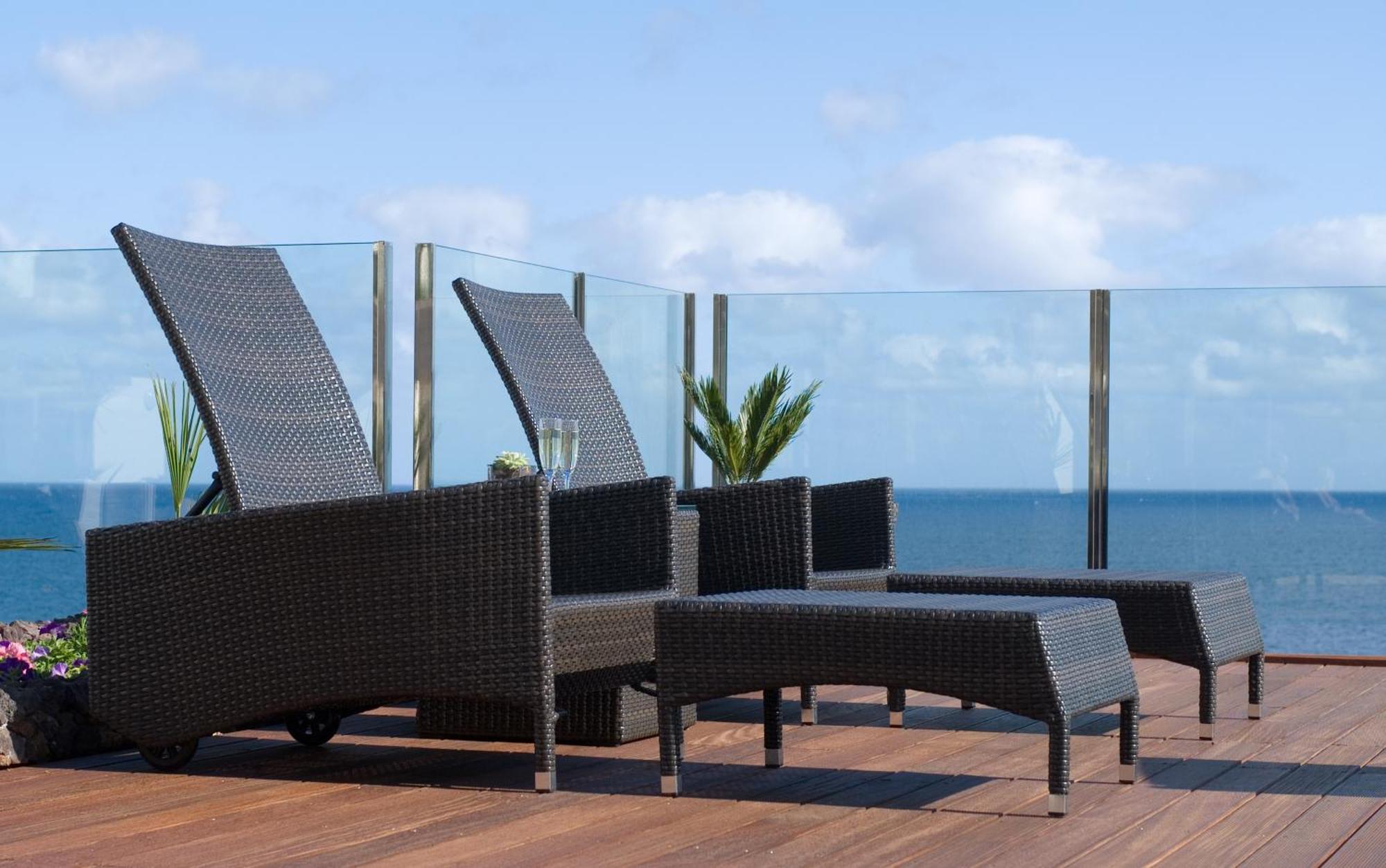 Pestana Carlton Madeira Ocean Resort Hotel Funchal  Exterior photo A glass balustrade