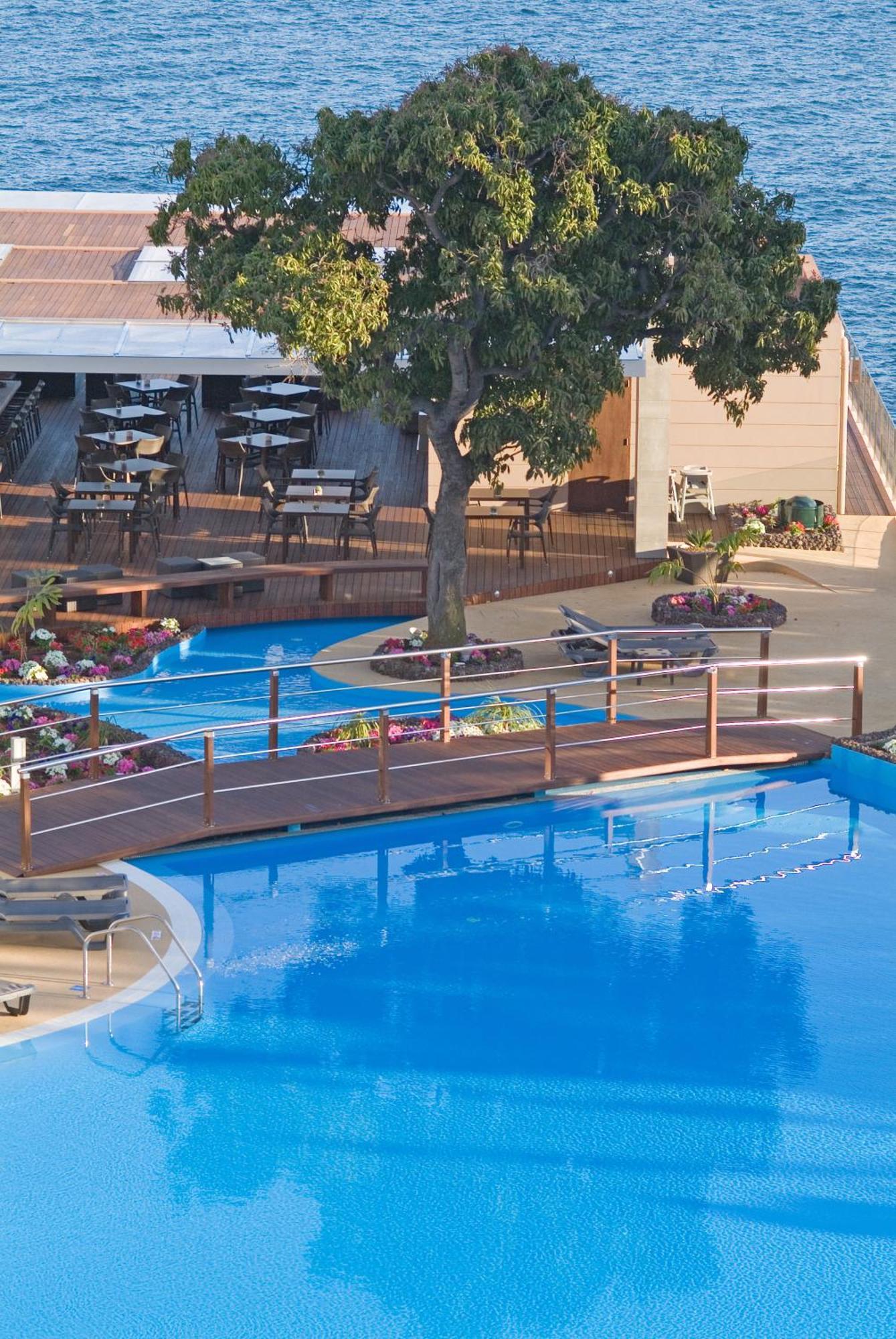 Pestana Carlton Madeira Ocean Resort Hotel Funchal  Exterior photo The pool at the hotel
